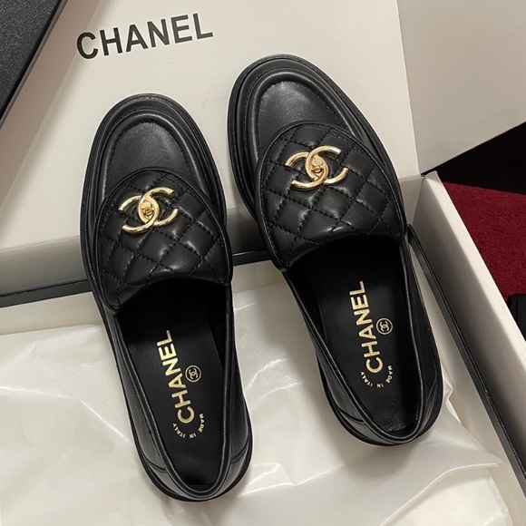 CHANEL Quilted Black Loafers with Gold Logo - Picture 1 of 5